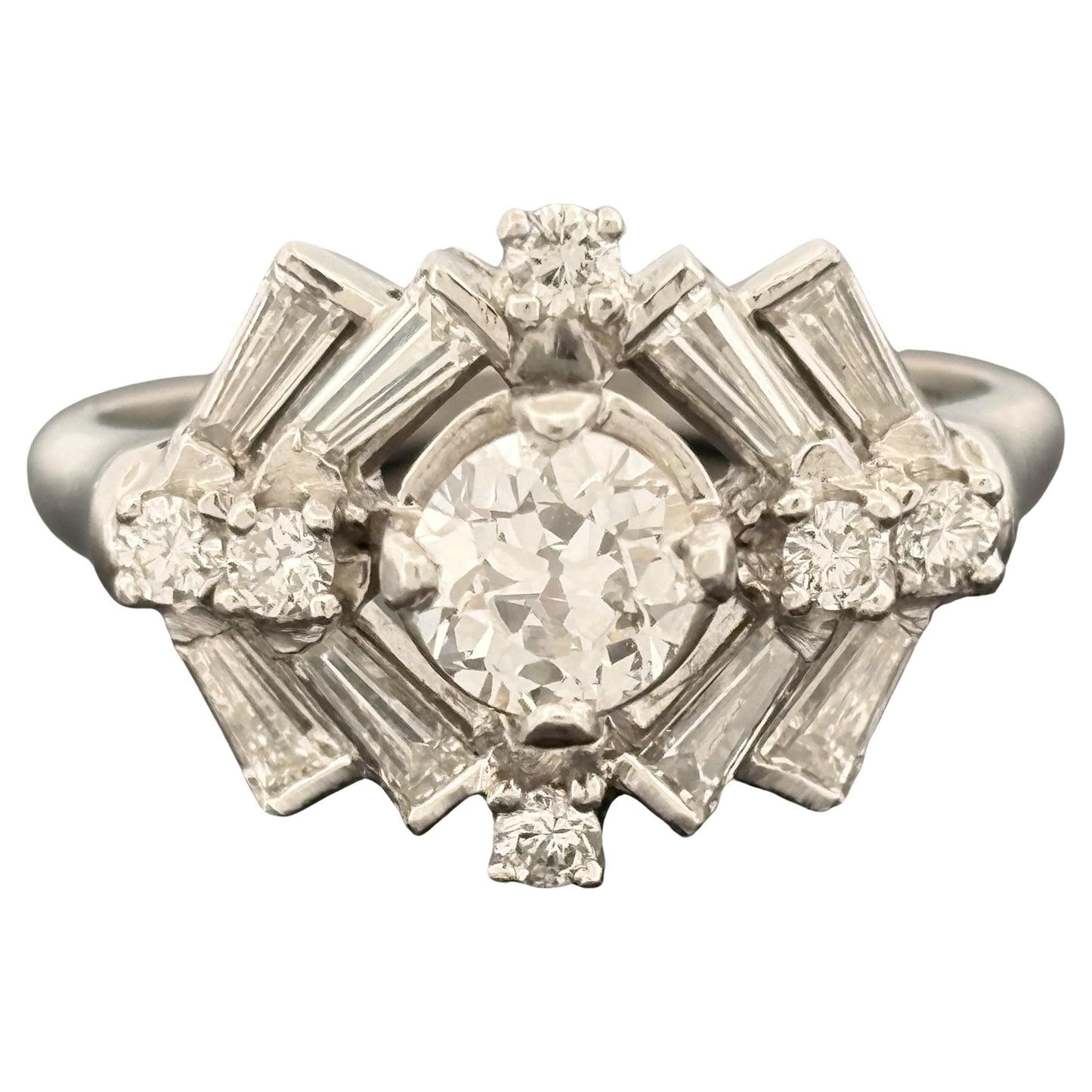 https://a.1stdibscdn.com/vintage-mid-century-platinum-european-cut-diamond-cocktail-ring-187ctw-for-sale/j_43992/j_284448821769459946968/j_28444882_1769459947836_bg_processed.jpg
