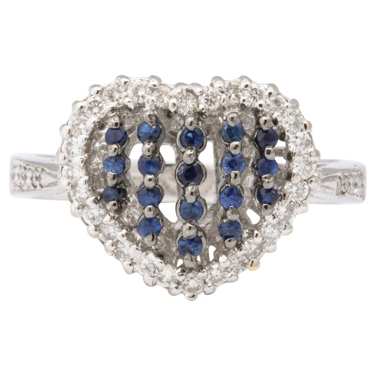 https://a.1stdibscdn.com/blue-sapphire-and-diamond-heart-ring-for-sale-picture-4/j_415/j_130857321629391603959/6R1A5021_master.jpg?width=768