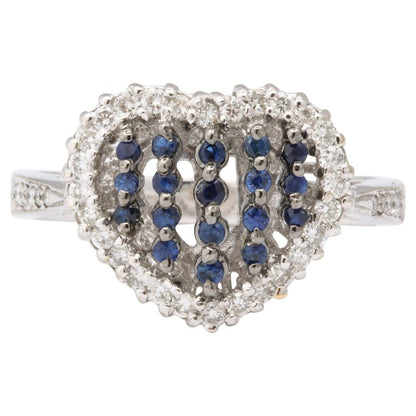 https://a.1stdibscdn.com/blue-sapphire-and-diamond-heart-ring-for-sale-picture-4/j_415/j_130857321629391603959/6R1A5021_master.jpg?width=768