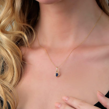 10K Yellow Gold Blue Sapphire and White Diamond Teardrop Pendant Necklace for Women (0.55 Cttw, Gemstone September Birthstone, Oval 6X4MM, with 18 Inch Chain)
