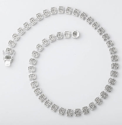 https://a.1stdibscdn.com/emerald-cut-diamond-necklace-illusion-set-for-sale-picture-5/j_415/j_99658421595349090047/6R1A3838_master.jpg?width=768