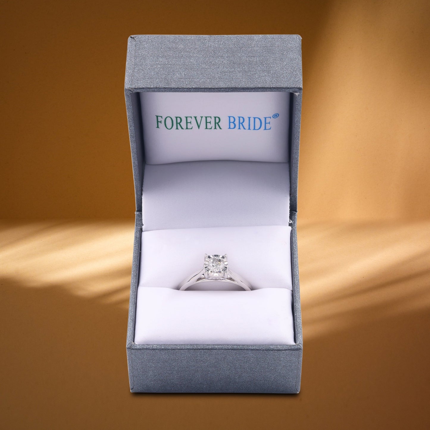 1/2 Carat T.W. round Diamond 10 Kt White Gold Miracle Plate Solitaire Engagement Ring