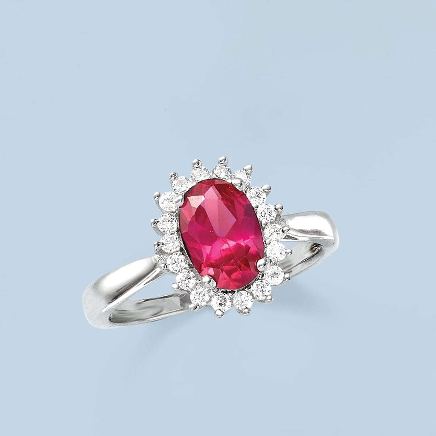 2.20 Carat Simulated Ruby and .20 Ct. T.W. CZ Halo Ring in Sterling Silver