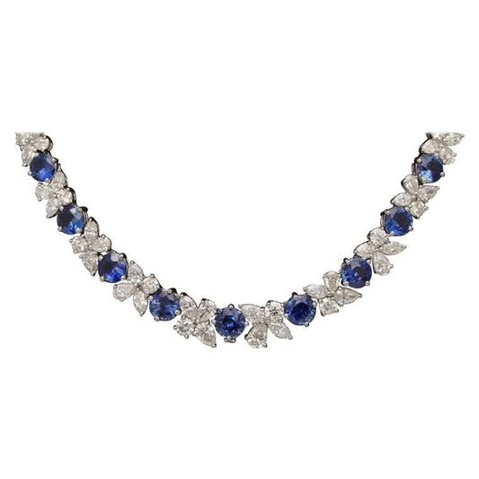 https://a.1stdibscdn.com/blue-sapphire-and-diamond-necklace-for-sale/1121189/j_227289521715775464642/22728952_datamatics.jpg?width=768