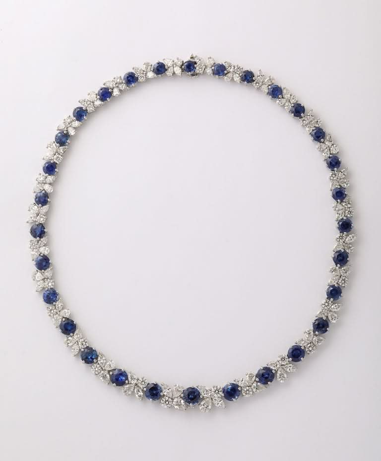 https://a.1stdibscdn.com/blue-sapphire-and-diamond-necklace-for-sale-picture-5/j_415/j_227289521714486587720/2P6A1550_master.jpg?width=768