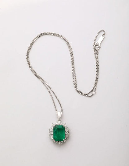 GIA Certified 5.75 Carat Colombian Emerald and Diamond Platinum Pendant