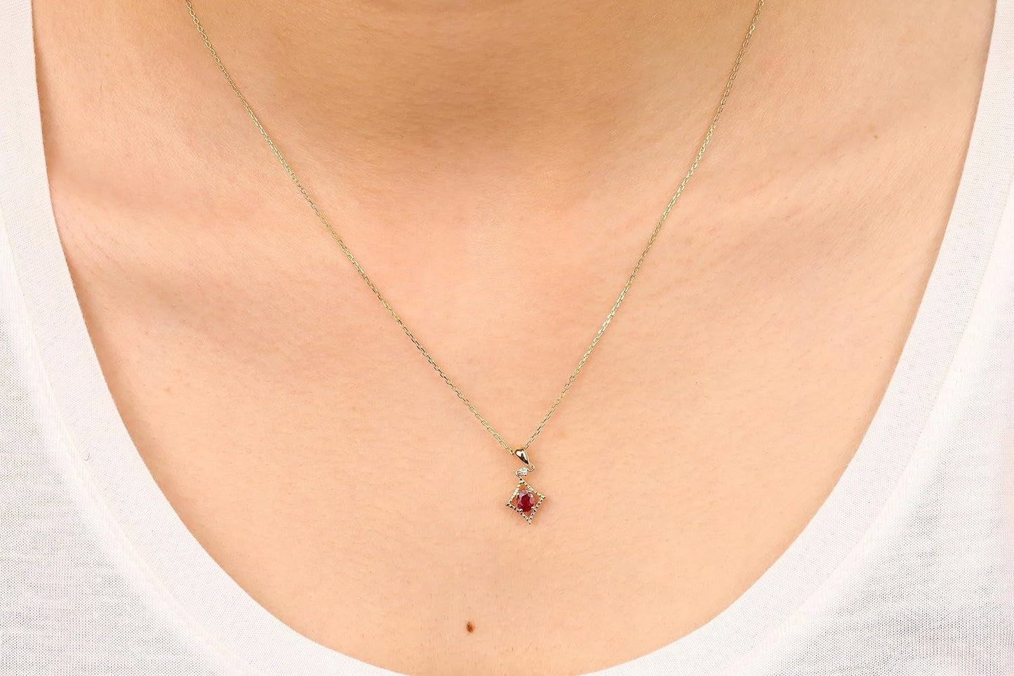 10K Yellow Gold Genuine Ruby and Natural Diamond (I1) Pendant for Women.