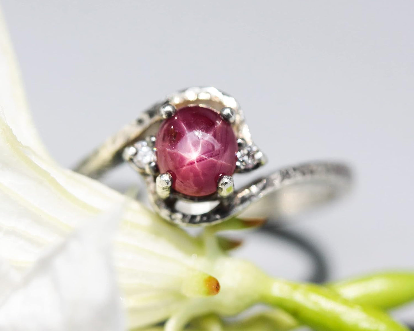 Oval Cabochon Star Ruby Ring in Prongs Setting and Diamonds Side Set with Sterling Silver Texture Band