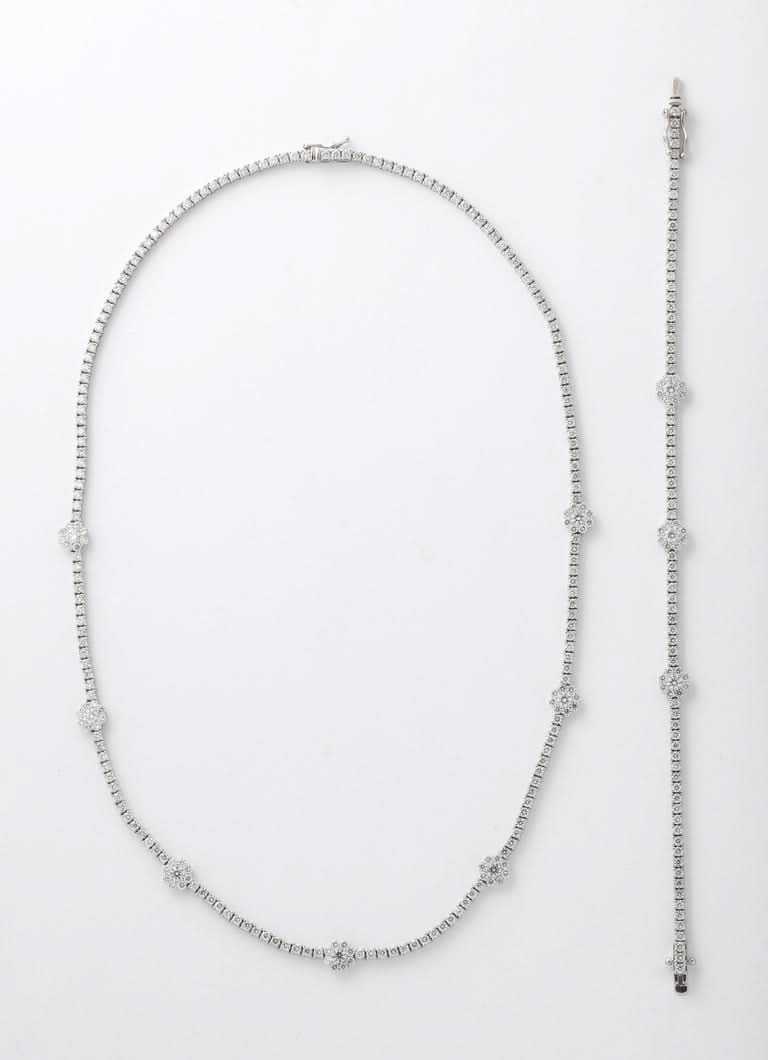 https://a.1stdibscdn.com/flower-diamond-tennis-necklace-for-sale-picture-4/j_415/j_216141721705596939551/6R1A0180_master.jpg?width=768