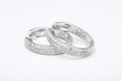 https://a.1stdibscdn.com/pave-diamond-oval-hoop-earrings-for-sale-picture-5/j_415/j_124611321622815537421/6R1A0527_master.jpg?width=768