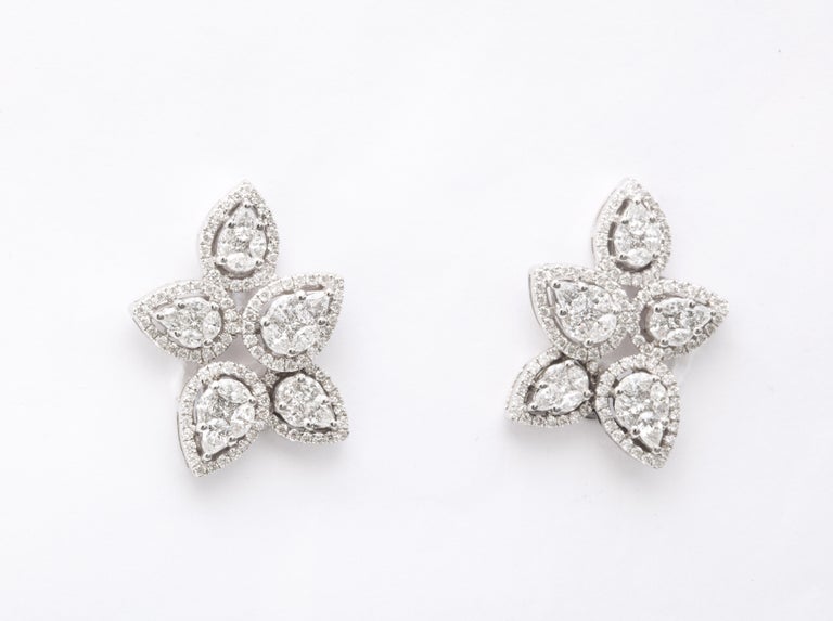 https://a.1stdibscdn.com/diamond-cluster-earrings-for-sale-picture-5/j_415/j_140275121637953079559/6R1A1270_master.jpg?width=768