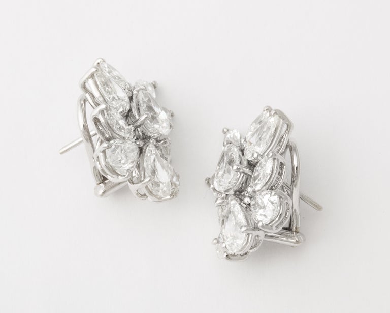 https://a.1stdibscdn.com/diamond-cluster-earrings-for-sale-picture-7/j_415/j_172984621666015948808/6R1A1310_master.jpg?width=768
