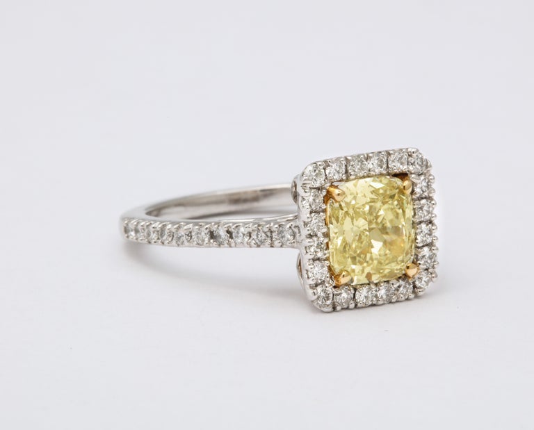 GIA Certified 1.71 Carat Yellow Diamond Cushion Cut Platinum Ring