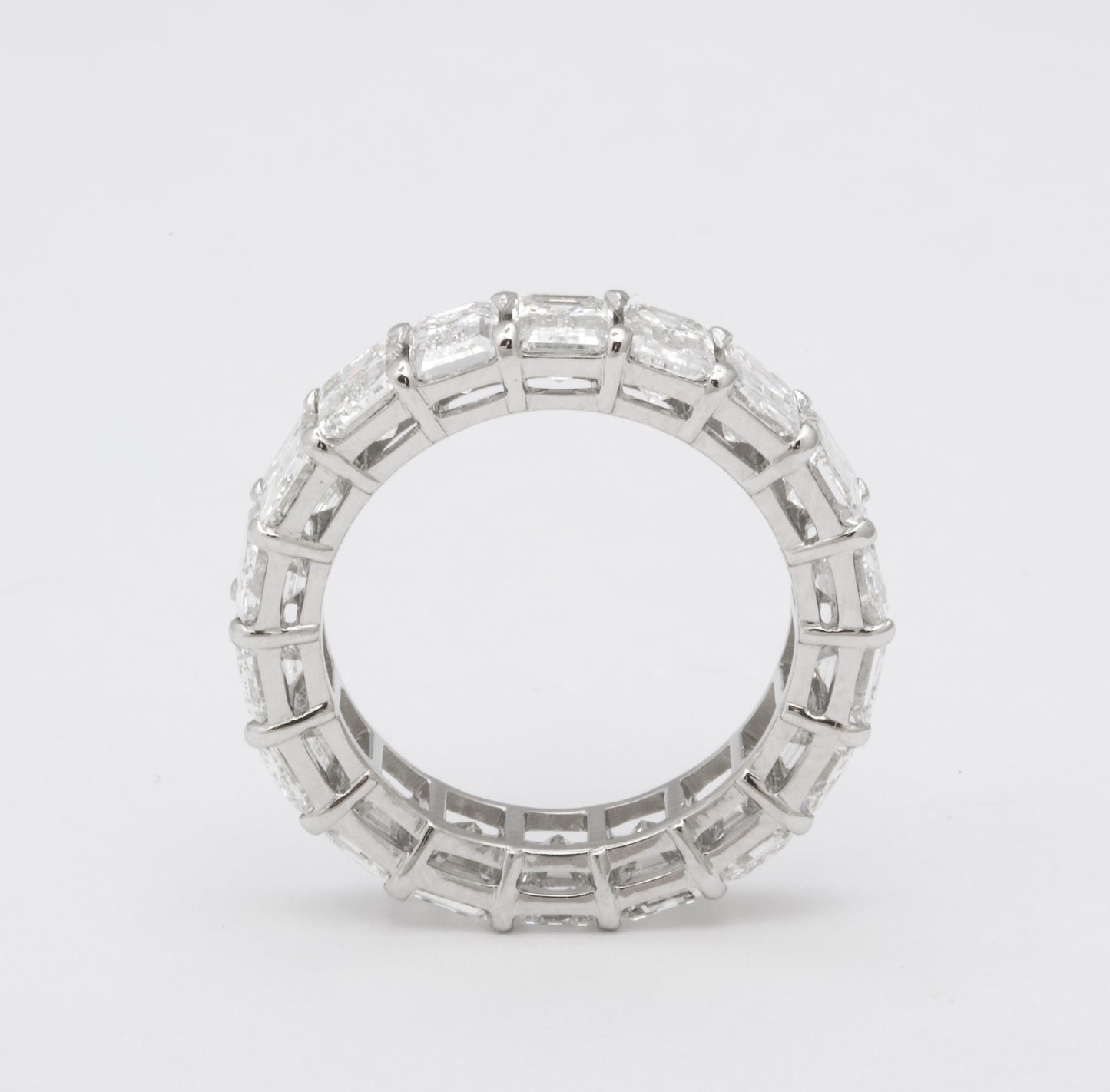 Exquisite 7.82 Carat Emerald Cut Diamond Platinum Eternity Band Ring