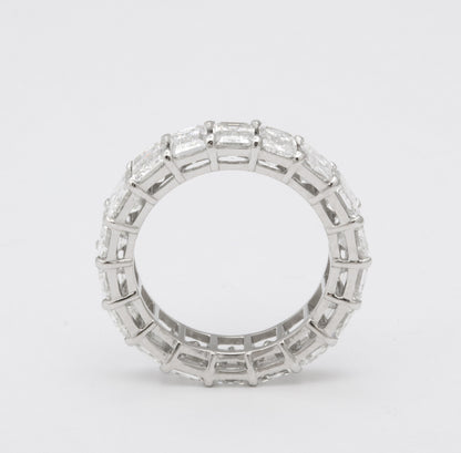 Exquisite 7.82 Carat Emerald Cut Diamond Platinum Eternity Band Ring