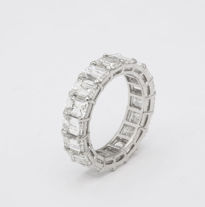 Exquisite 7.82 Carat Emerald Cut Diamond Platinum Eternity Band Ring