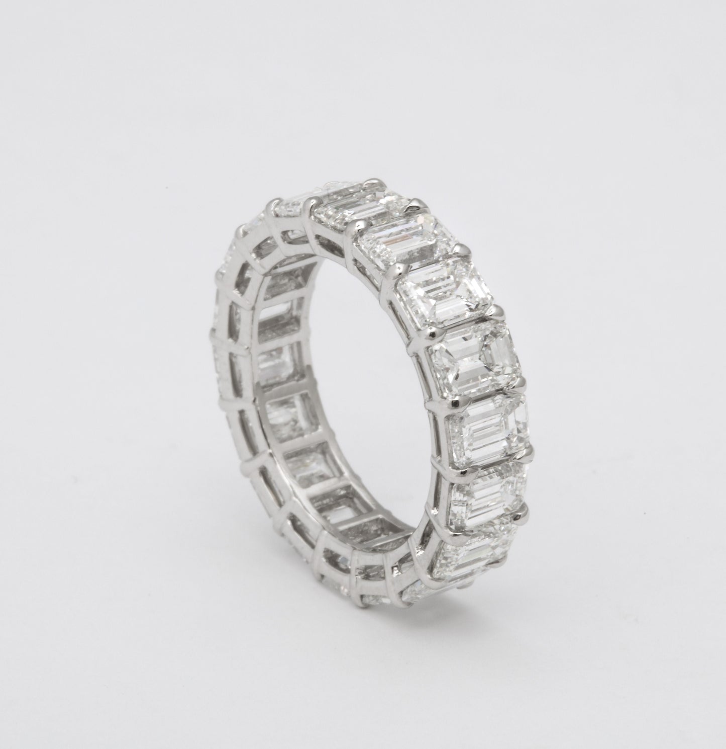 Exquisite 7.82 Carat Emerald Cut Diamond Platinum Eternity Band Ring