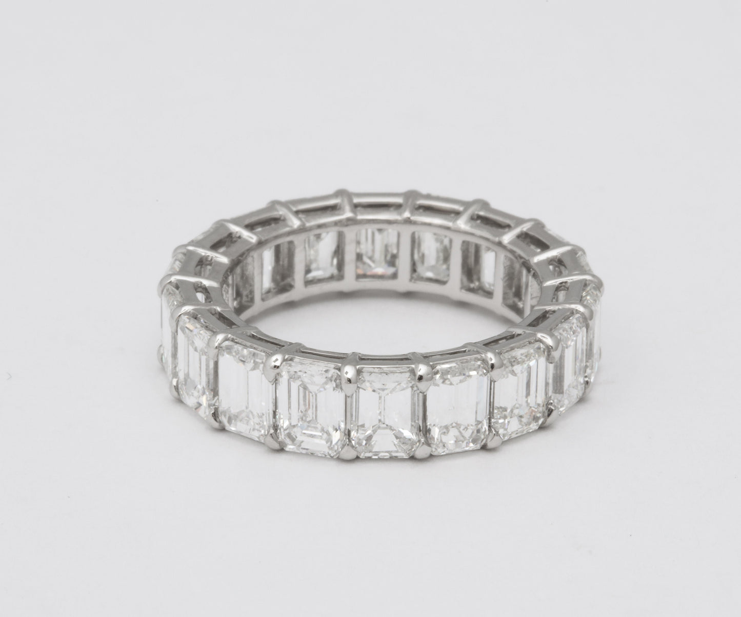 Exquisite 7.82 Carat Emerald Cut Diamond Platinum Eternity Band Ring