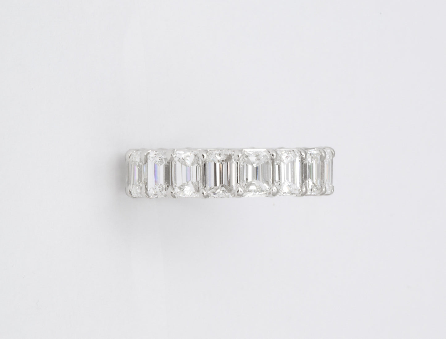 Exquisite 7.82 Carat Emerald Cut Diamond Platinum Eternity Band Ring