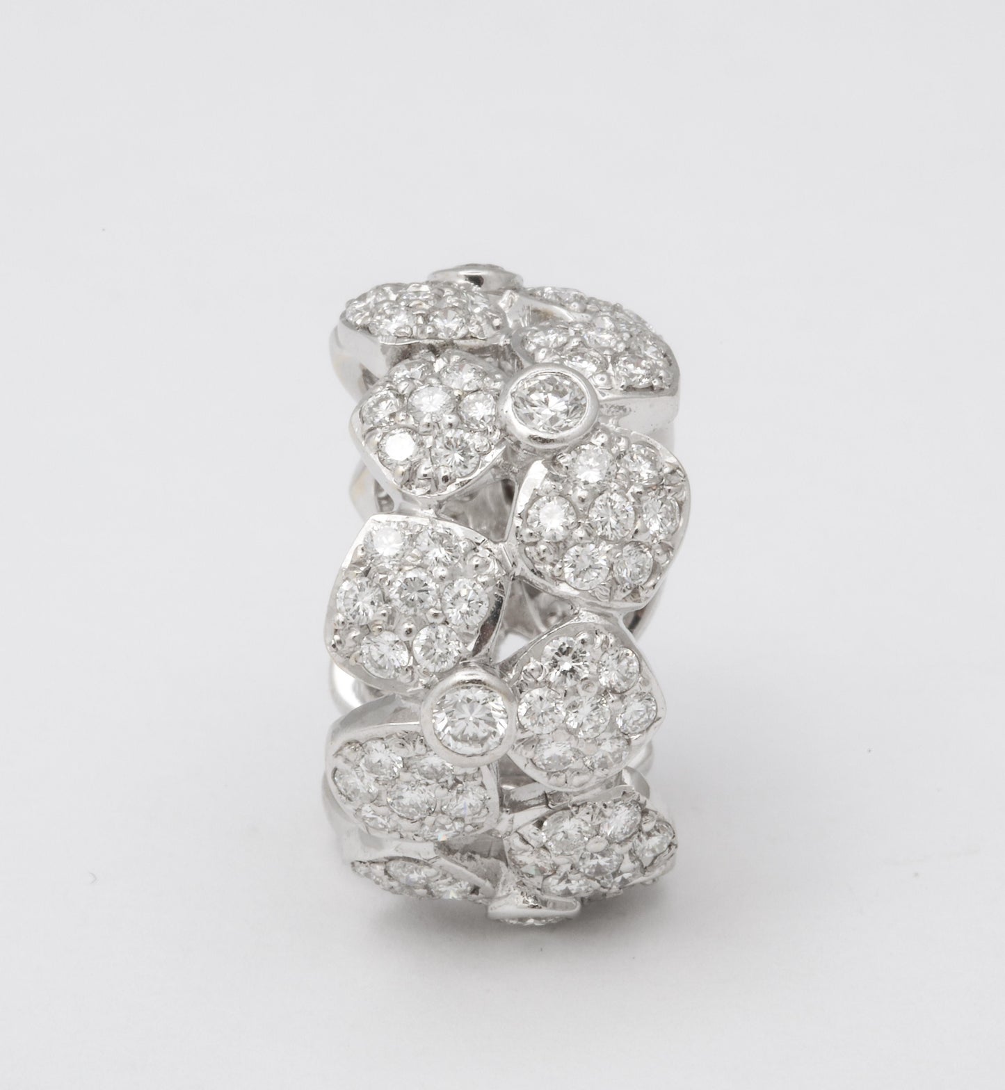 https://a.1stdibscdn.com/wide-diamond-flower-band-for-sale-picture-5/j_415/j_133715621632146836935/6R1A4958_master.jpg