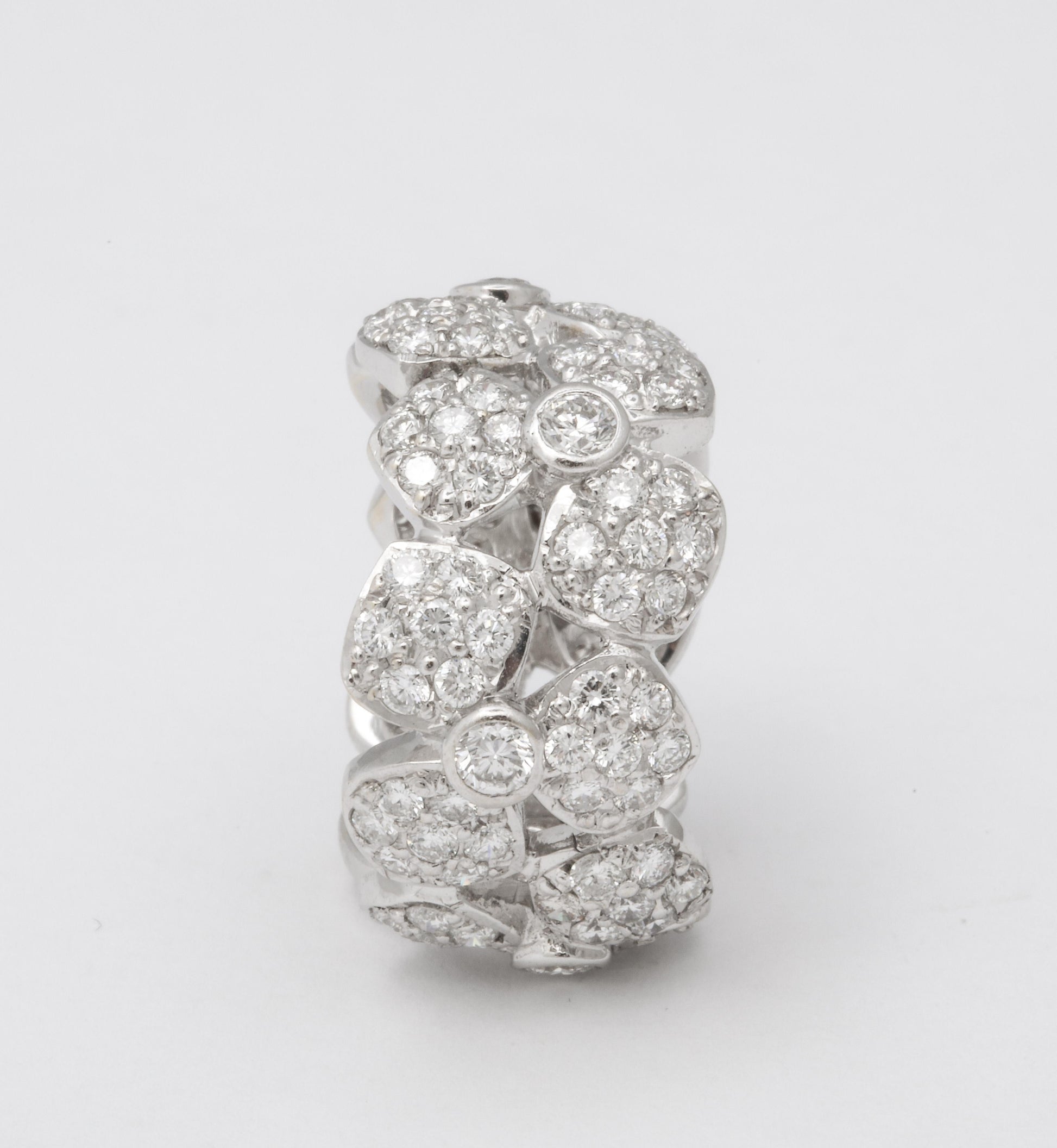 https://a.1stdibscdn.com/wide-diamond-flower-band-for-sale-picture-5/j_415/j_133715621632146836935/6R1A4958_master.jpg