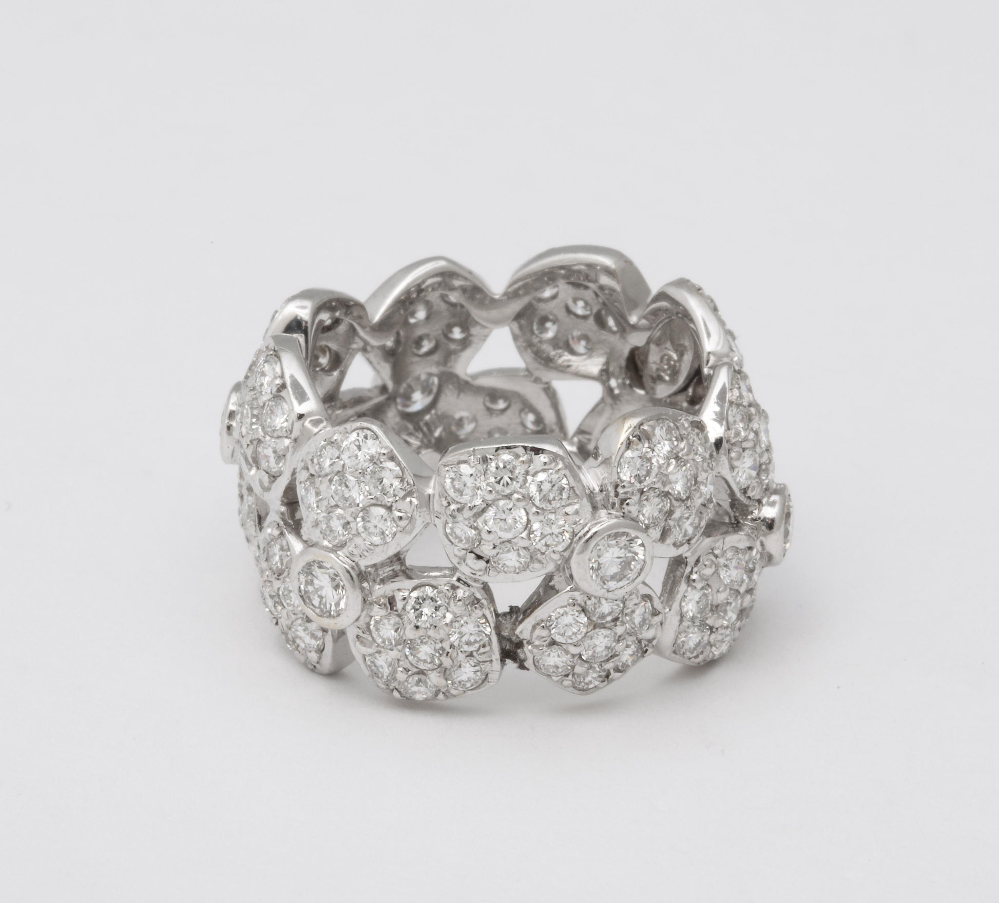 https://a.1stdibscdn.com/wide-diamond-flower-band-for-sale-picture-10/j_415/j_133715621632146840033/6R1A4969_master.jpg