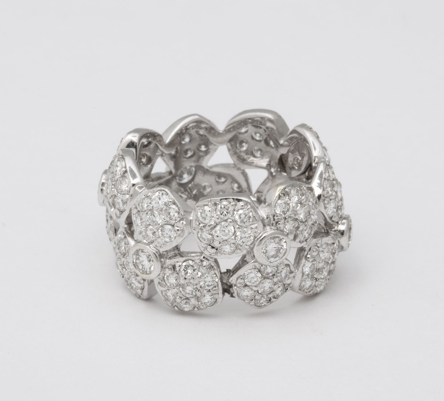 https://a.1stdibscdn.com/wide-diamond-flower-band-for-sale-picture-10/j_415/j_133715621632146840033/6R1A4969_master.jpg