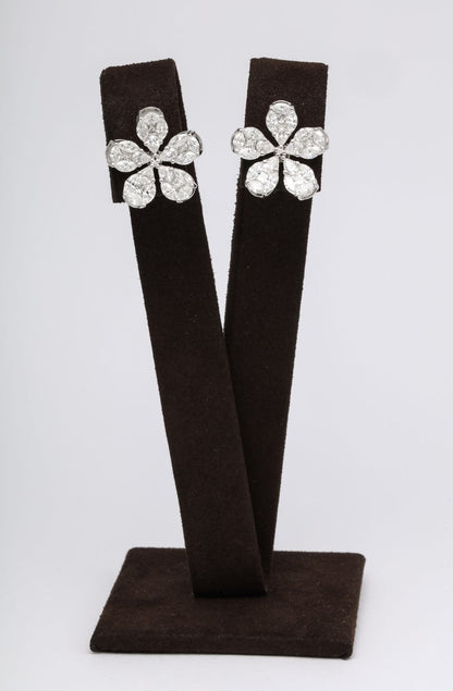 https://a.1stdibscdn.com/diamond-flower-earrings-for-sale-picture-5/j_415/1575403223556/6R1A5028_master.jpg?width=768
