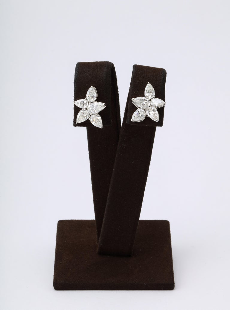 https://a.1stdibscdn.com/cluster-diamond-earrings-for-sale-picture-5/j_415/j_167933421661437836744/6R1A5079_master.jpg?width=768