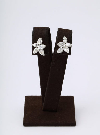 https://a.1stdibscdn.com/cluster-diamond-earrings-for-sale-picture-5/j_415/j_167933421661437836744/6R1A5079_master.jpg?width=768