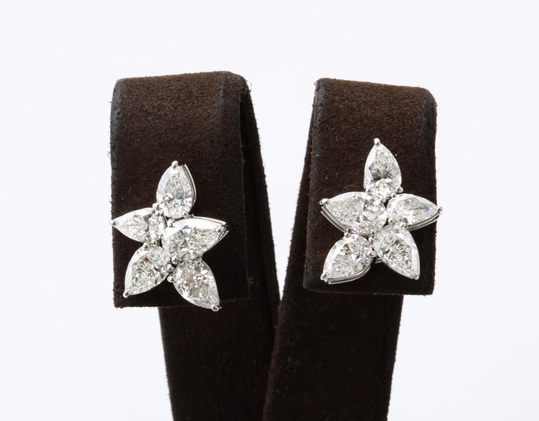 https://a.1stdibscdn.com/cluster-diamond-earrings-for-sale-picture-9/j_415/j_167933421661437842602/6R1A5086_master.jpg?width=768