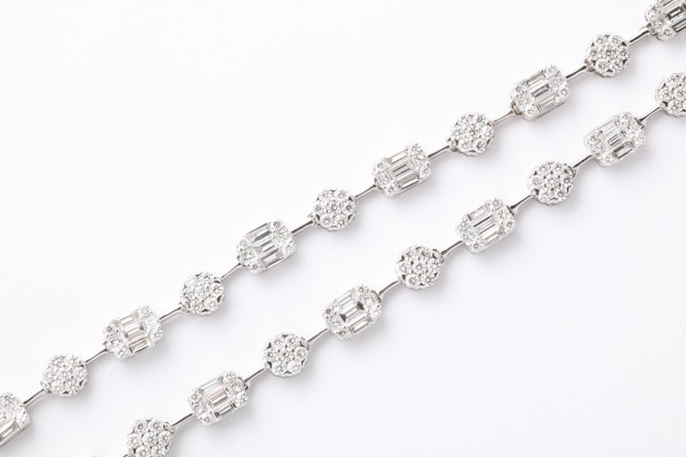 https://a.1stdibscdn.com/round-and-emerald-cut-diamond-illusion-set-necklace-for-sale-picture-9/j_415/j_164752621658414306290/6R1A5114_master.jpg?width=768
