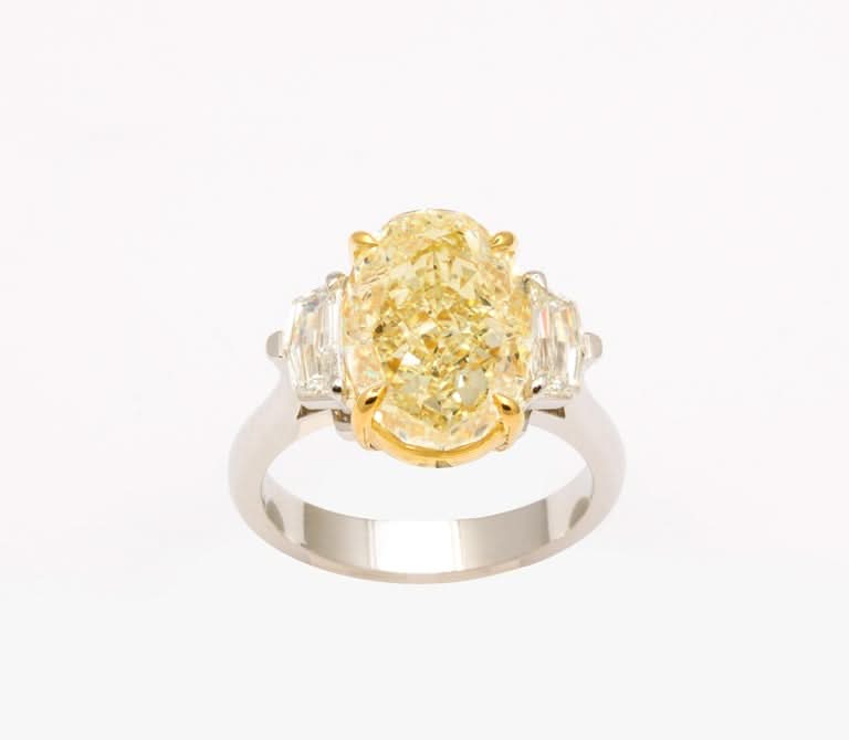 Stunning 6 Carat Oval Yellow Diamond Ring GIA Certified Platinum
