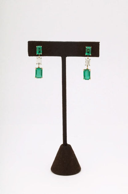 https://a.1stdibscdn.com/emerald-and-diamond-dangle-drop-earrings-for-sale-picture-7/j_415/j_180977921672758061894/6R1A5271_master.jpg?width=768
