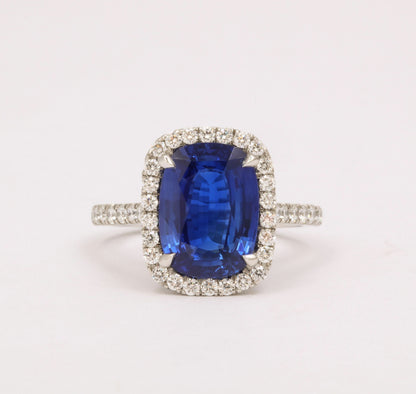 https://a.1stdibscdn.com/cushion-cut-blue-sapphire-and-diamond-halo-ring-for-sale-picture-6/j_415/j_194450021685541114340/6R1A5486_master.jpg