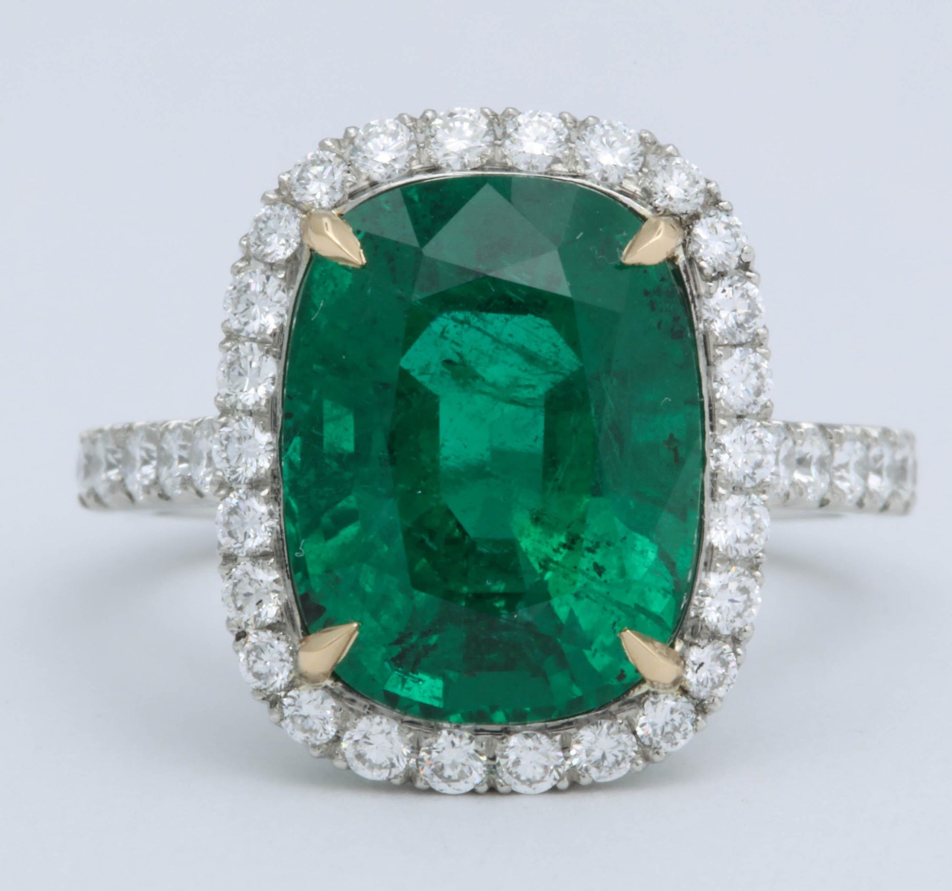 https://a.1stdibscdn.com/5-carat-green-emerald-cushion-cut-diamond-halo-ring-gia-certified-no-oil-for-sale-picture-5/0/j_48413131535730121229/6R1A5993_master.jpg