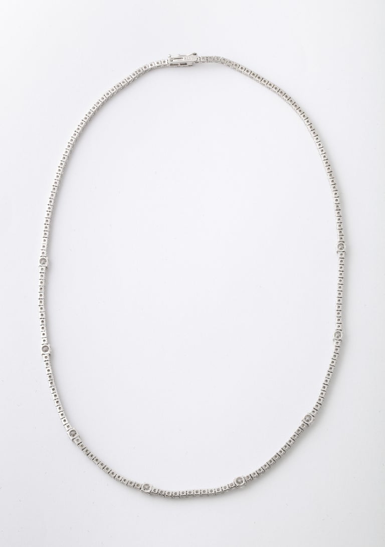 https://a.1stdibscdn.com/diamond-tennis-necklace-for-sale-picture-2/j_415/j_166501421659967985201/6R1A6036_master.jpg?width=768