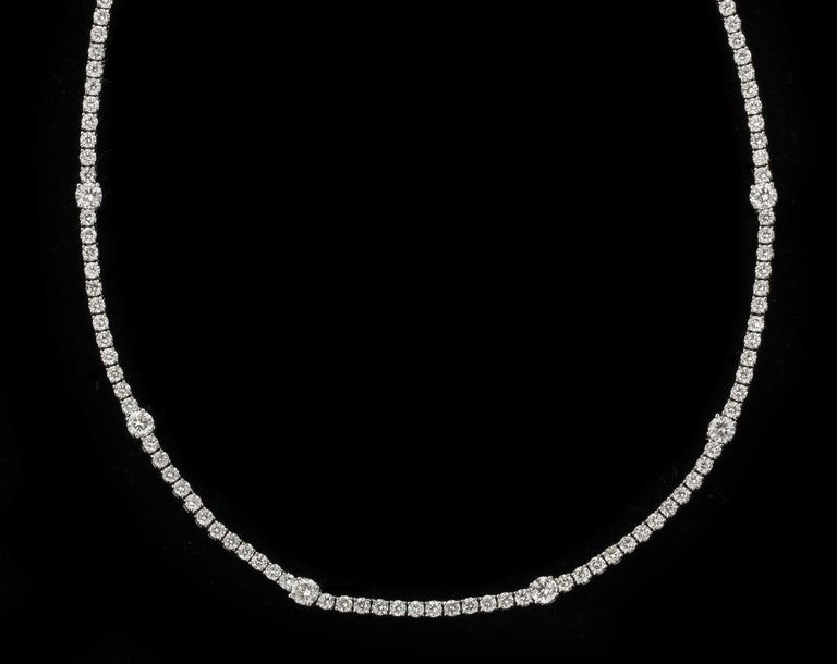 https://a.1stdibscdn.com/diamond-tennis-necklace-for-sale-picture-9/j_415/j_166501421659967982476/6R1A6031_master.jpg?width=768
