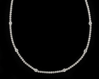 https://a.1stdibscdn.com/diamond-tennis-necklace-for-sale-picture-9/j_415/j_166501421659967982476/6R1A6031_master.jpg?width=768