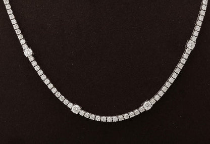 https://a.1stdibscdn.com/diamond-tennis-necklace-for-sale-picture-5/j_415/j_166501421659967983240/6R1A6026_master.jpg?width=768