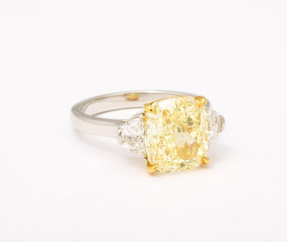 https://a.1stdibscdn.com/5-carat-yellow-diamond-ring-for-sale-picture-9/j_415/j_154958521650391214999/6R1A6666_master.jpg?width=768
