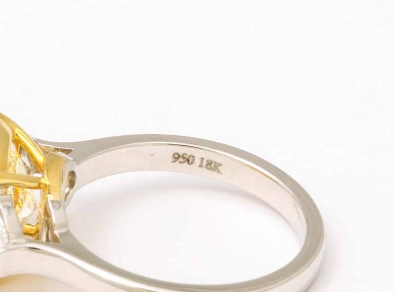 GIA Certified 5 Carat Fancy Light Yellow Cushion Cut Diamond Ring