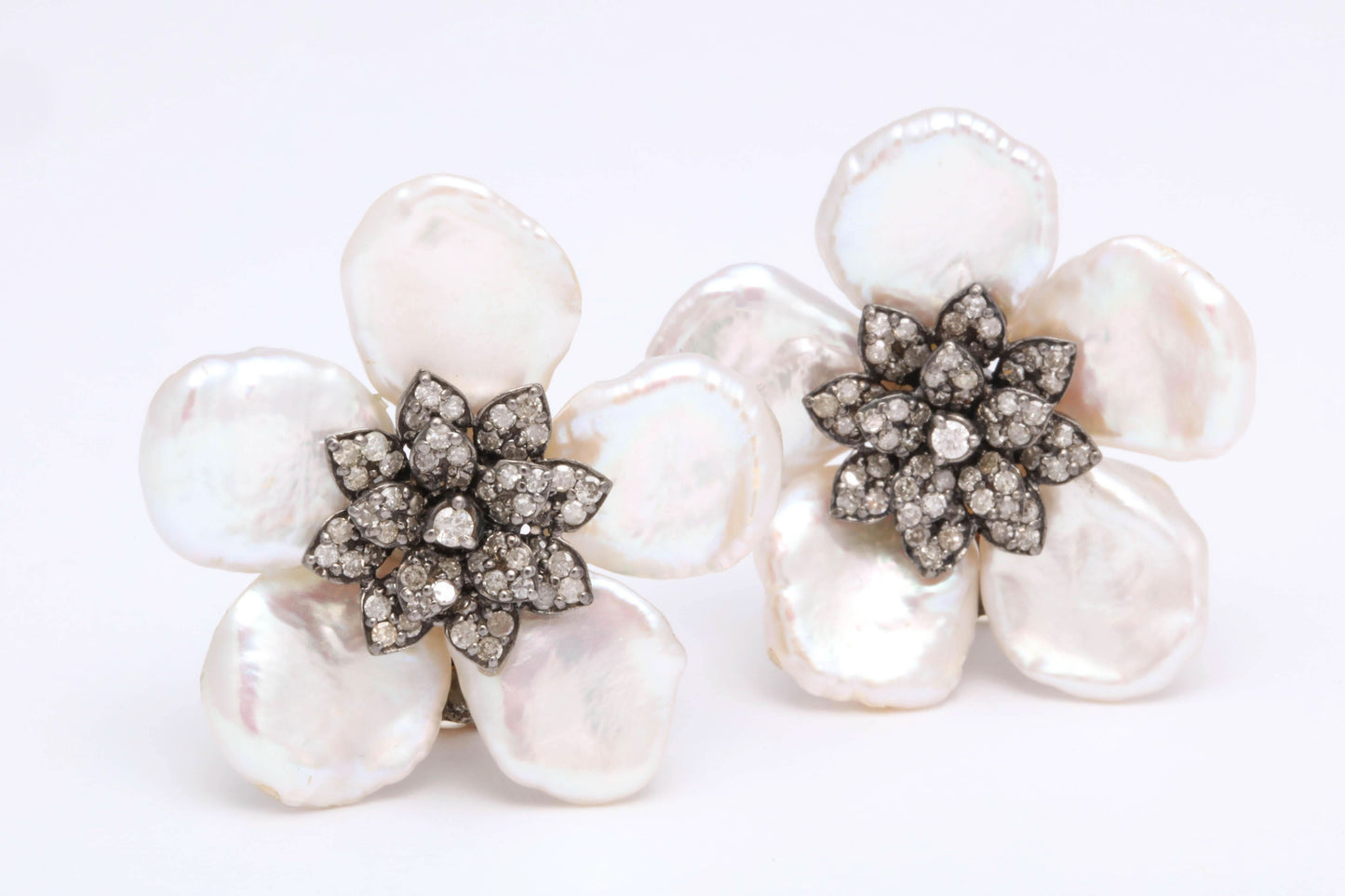 https://a.1stdibscdn.com/pearl-leaf-and-diamond-flower-earring-for-sale-picture-5/j_415/j_130060421628558032950/6R1A7168_master.jpg