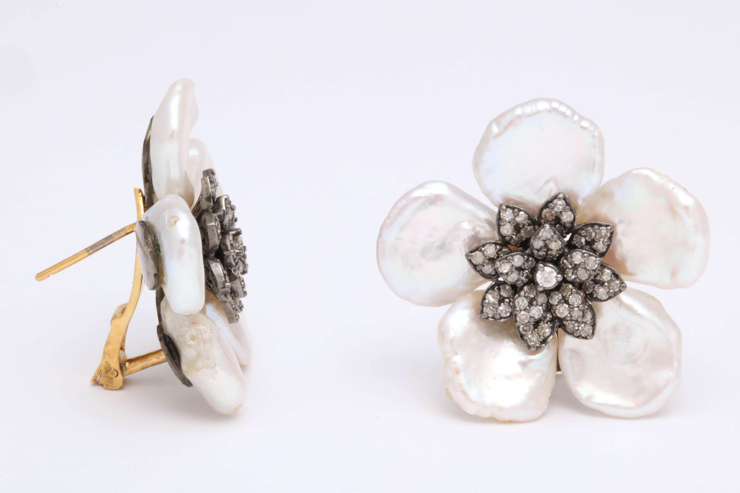 https://a.1stdibscdn.com/pearl-leaf-and-diamond-flower-earring-for-sale-picture-9/j_415/j_130060421628558035024/6R1A7172_master.jpg