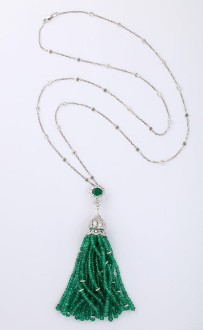 https://a.1stdibscdn.com/emerald-and-diamond-tassel-necklace-for-sale-picture-5/j_415/1605728020226/6R1A7459_master.jpg?width=768