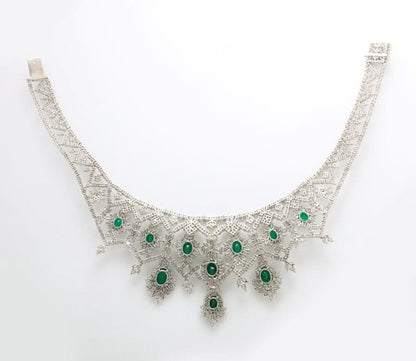 https://a.1stdibscdn.com/emerald-and-diamond-choker-necklace-for-sale-picture-3/j_415/j_183831221675869509658/6R1A7836_master.jpg?width=768