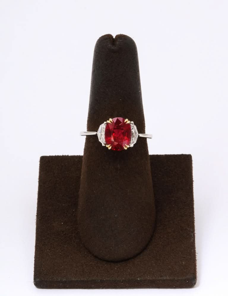 https://a.1stdibscdn.com/vivid-red-ruby-and-diamond-ring-for-sale-picture-5/j_415/j_143152421640712146201/6R1A8286_master.jpg?width=768