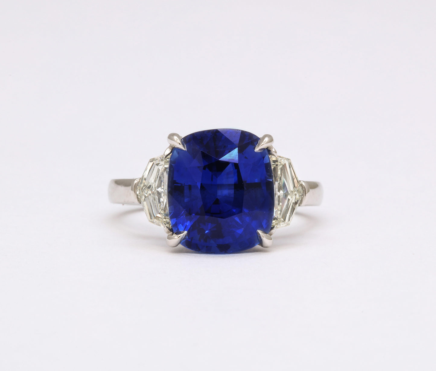 https://a.1stdibscdn.com/7-carat-cushion-cut-sapphire-and-diamond-ring-for-sale-picture-6/j_415/j_144397121641926941690/6R1A8305_master.jpg