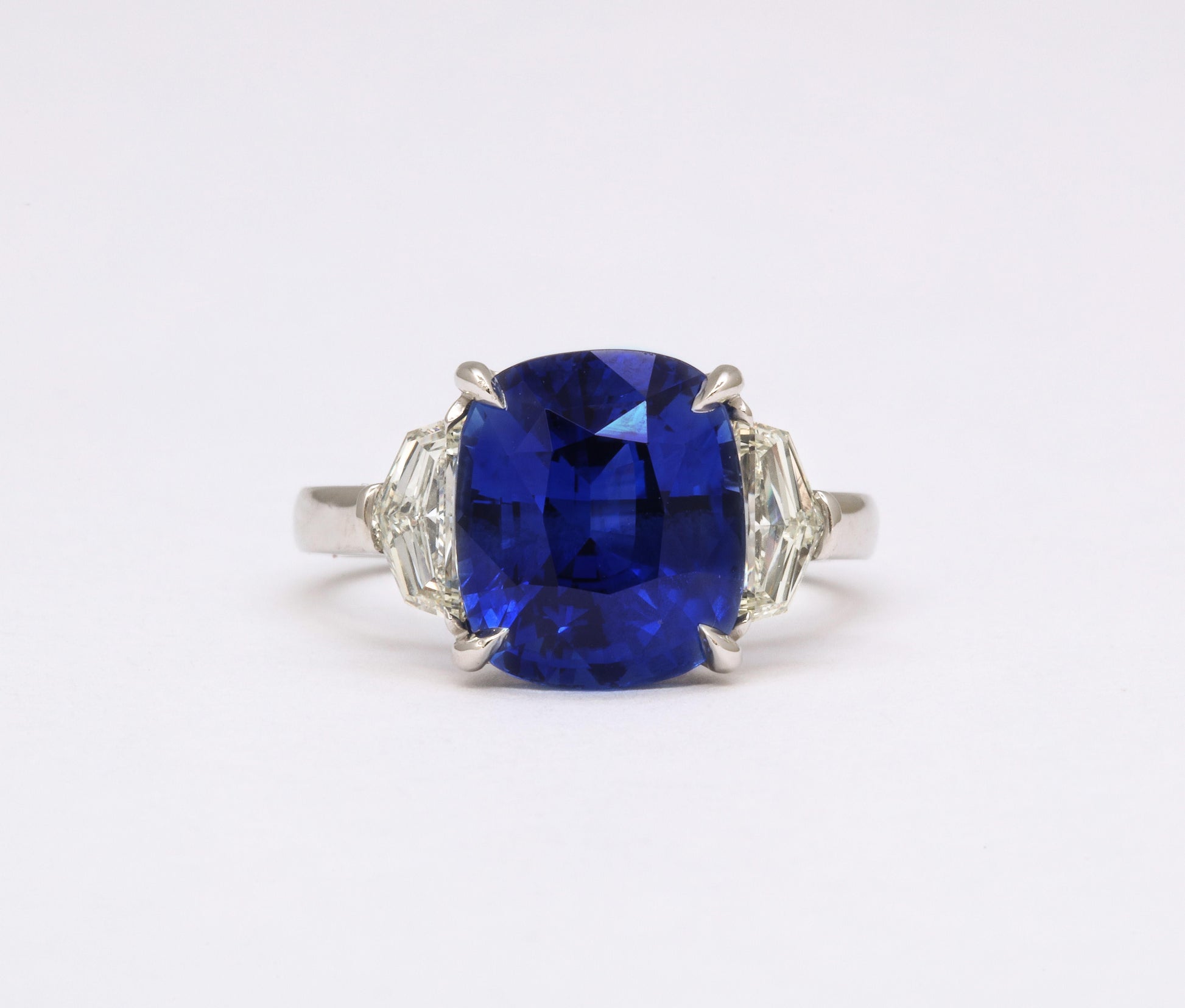 https://a.1stdibscdn.com/7-carat-cushion-cut-sapphire-and-diamond-ring-for-sale-picture-6/j_415/j_144397121641926941690/6R1A8305_master.jpg