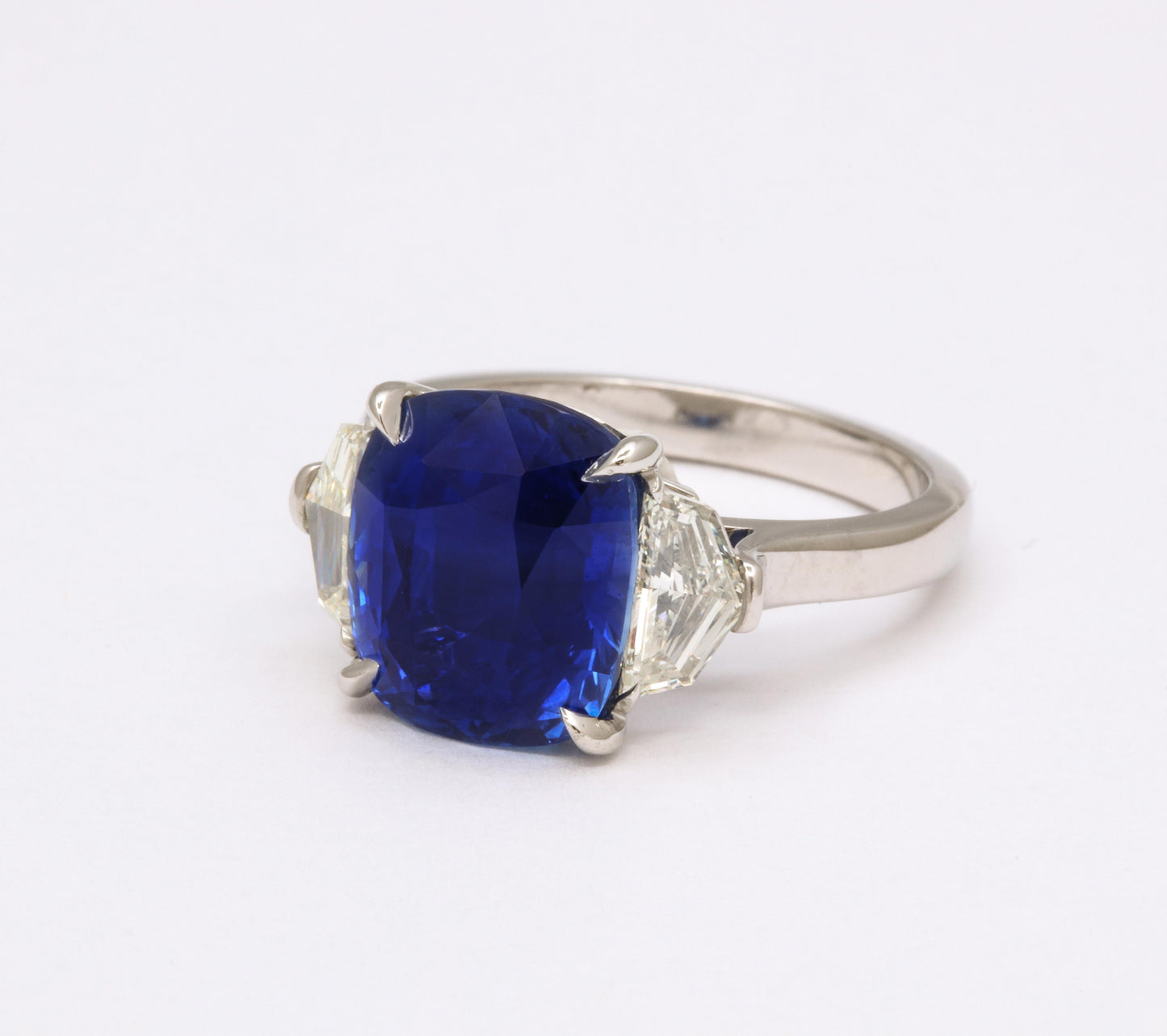 https://a.1stdibscdn.com/7-carat-cushion-cut-sapphire-and-diamond-ring-for-sale-picture-10/j_415/j_144397121641926939753/6R1A8310_master.jpg